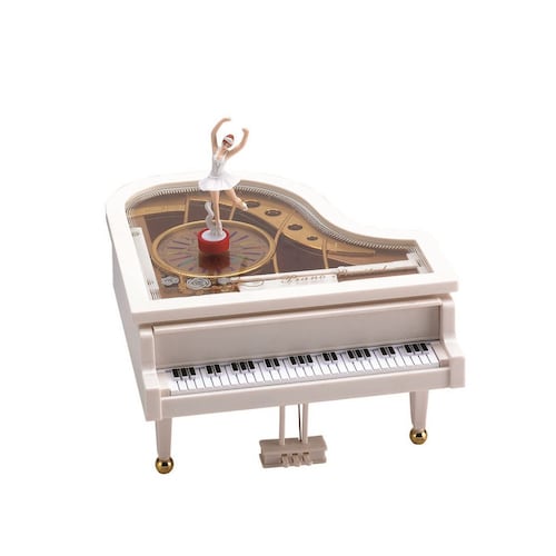 Figura de un piano con música