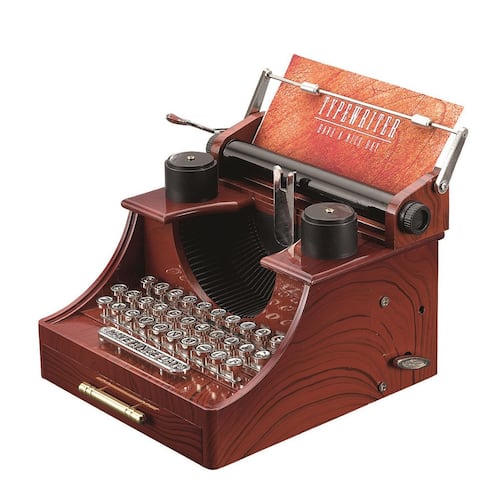 Figura máquina para escribir caja musical