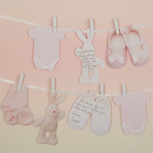 Guirnalda ropa Baby shower rosa