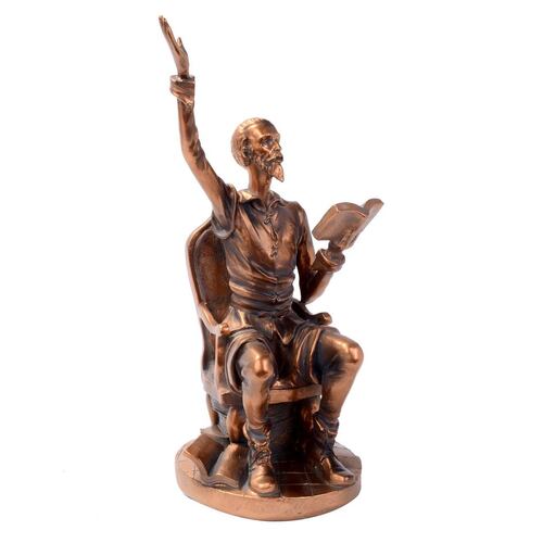Figura de Don Quijote sentado
