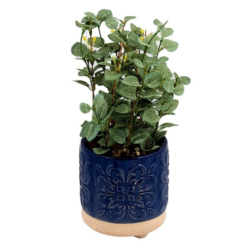 Maceta de cerámica color azul con planta artificial