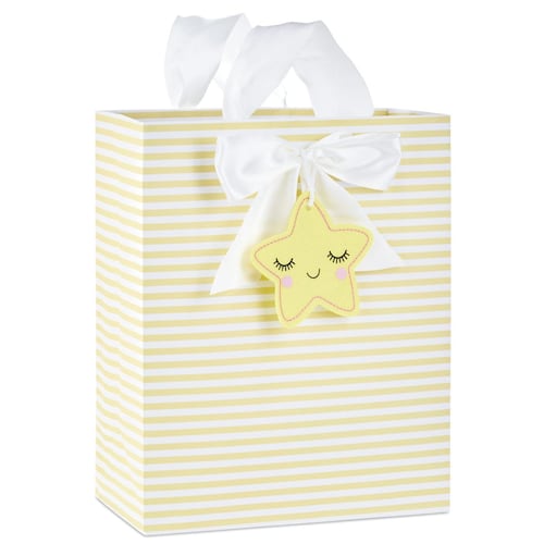 Bolsa de regalo grande con estrella sonriente sobre rayas amarillas
