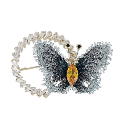 FB, Broche mariposa con navette champagne y circonita baguette cristal con acabado en chapado oro