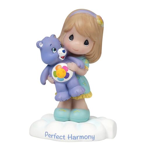 Care bear girl with harmony bear figurine