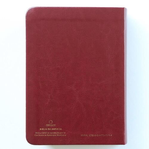 Biblia Católica en español. Símil piel vinotinto
