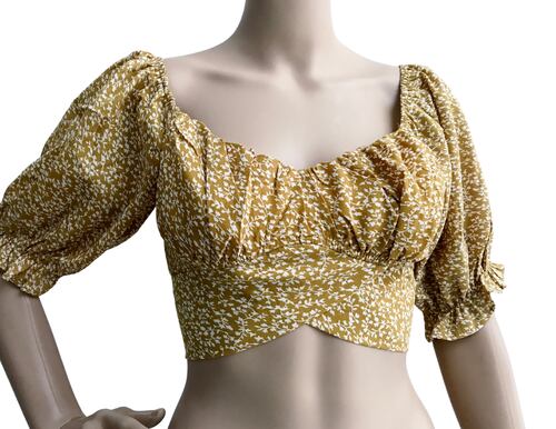 Blusa corta con hombros descubiertos, manga bombacha  y lazo para moño atrás  Papermoon