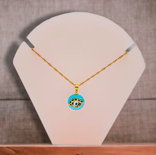 Collar en chapa de oro dije ojo turco.