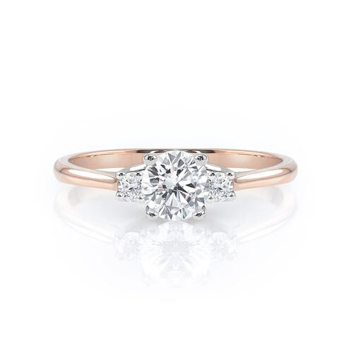 ANILLO DE COMPROMISO 10K ORO ROSA CON PIEDRA TRELIS ABBA JOYAS.