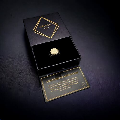 Anillo San Benito de oro 10k con piedra zirconia .