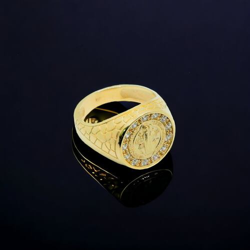 Anillo San Benito de oro 10k con piedra zirconia .