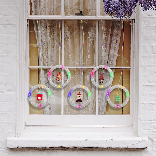 Cortina Serie Luz Aros Led Multicolor Figuras Navideñas 3mts