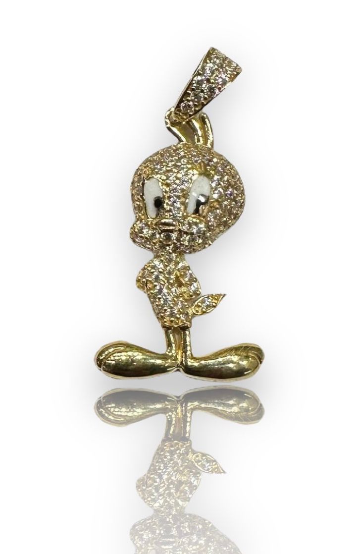 Dije Piolin Oro 14 k + Obsequio.