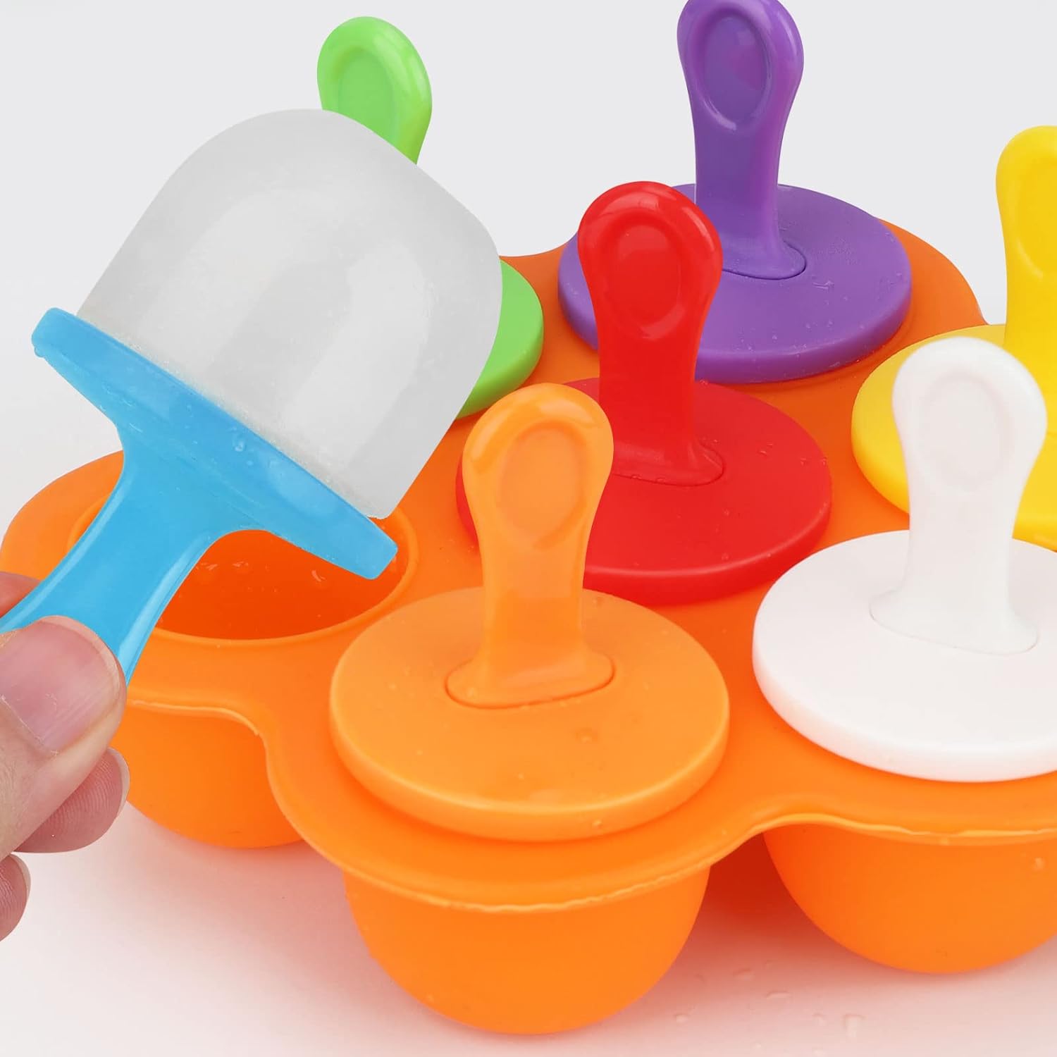 MOLDE PARA PALETAS HIELO GELATINA ECOMLAB 7 EN 1 SILICONA COLOR NARANJA.