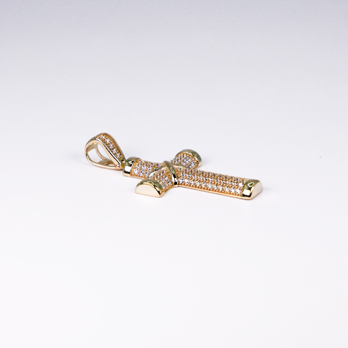 Dije cruz de oro amarillo 10k piedra zirconia.
