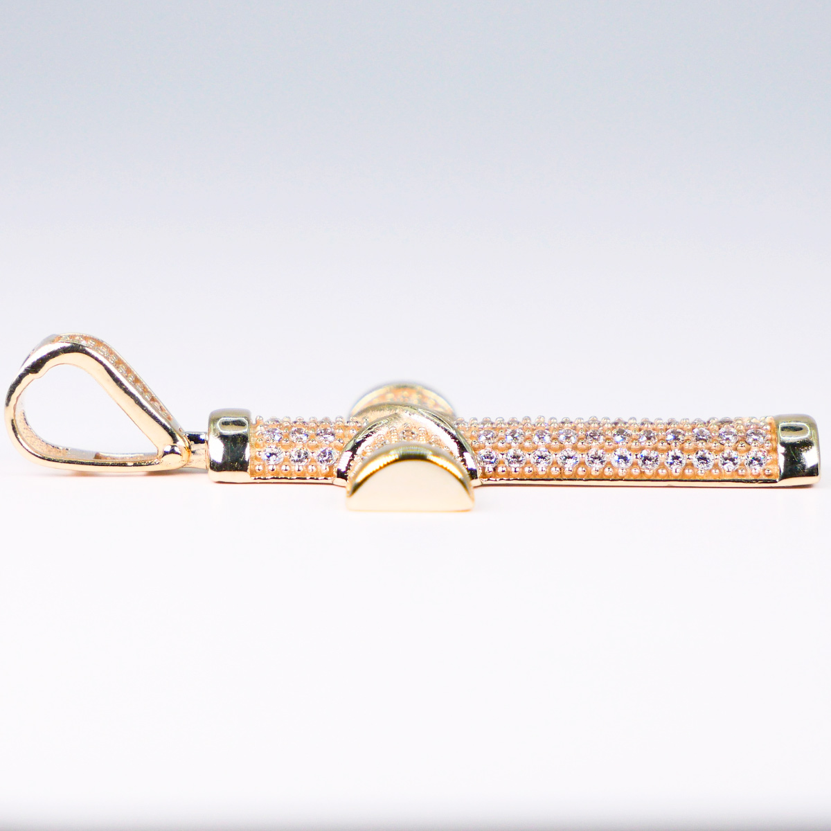 Dije cruz de oro amarillo 10k piedra zirconia.