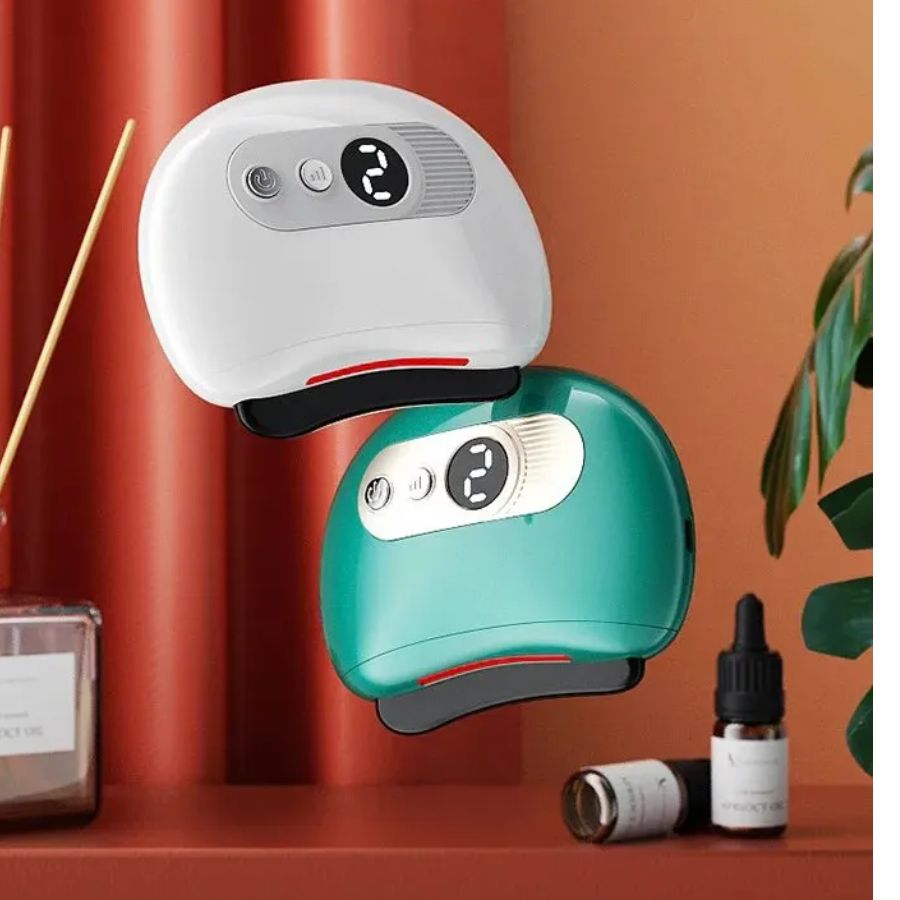 Guasha Electrica con Vibracion y Compresa Caliente incluye aceite corporal.