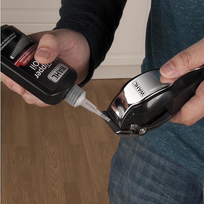 Wahl - Aceite lubricante de alta calidad para cortapelos para cortapelos, recortadores y corrosión de cuchillas para prevenir el óxido, 4 onzas líquidas, modelo 3310-300.