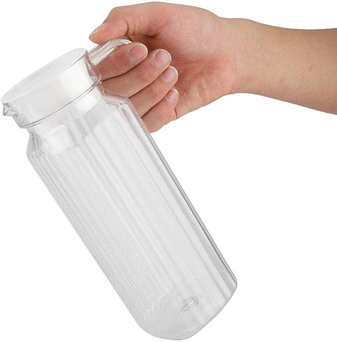 A Botella de jugo acrílico transparente a rayas, jarra de jugo frío con tapa, ideal para jugo casero y té frío o para botellas de leche de vidrio, botellas reutilizables (1100 ml).
