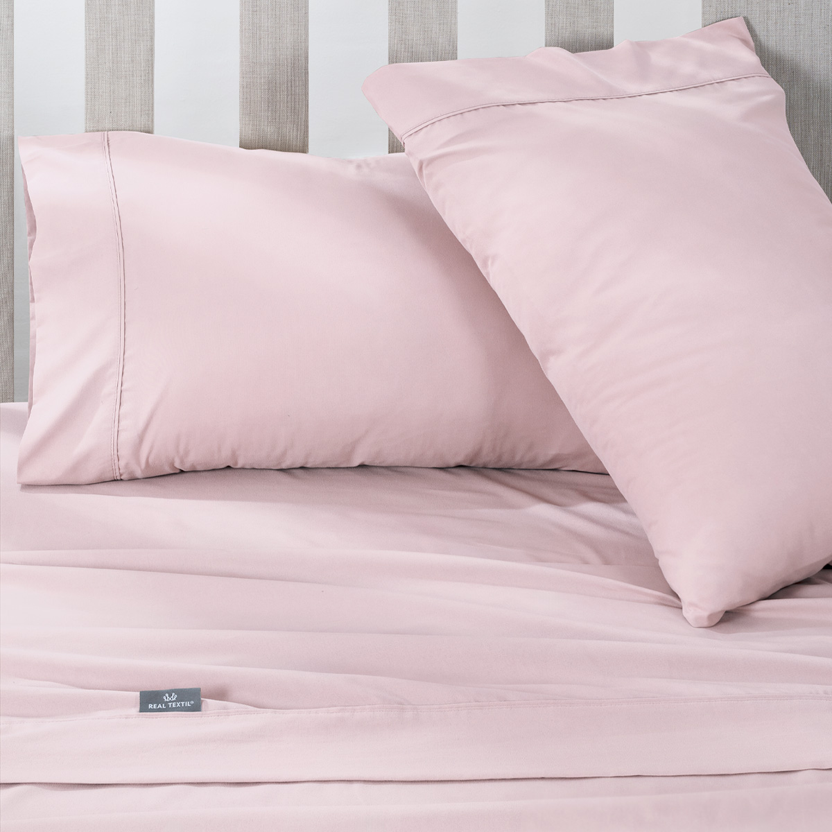 Juego de Sábanas Microfibra Queen Size Rosa REAL TEXTIL.