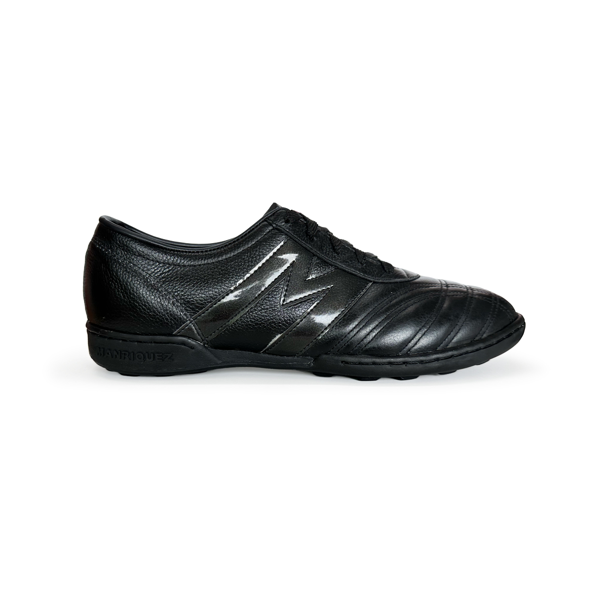 Manríquez Tenis de Fútbol Turf Negro Profesional
