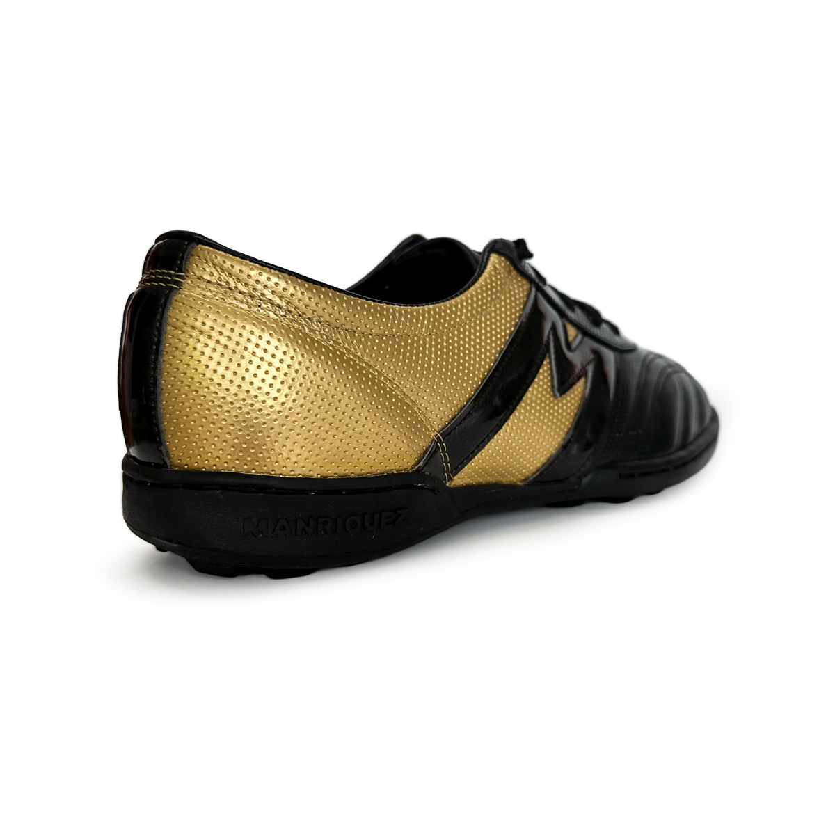 Manríquez Tenis de Fútbol Turf Negro/Oro Profesional