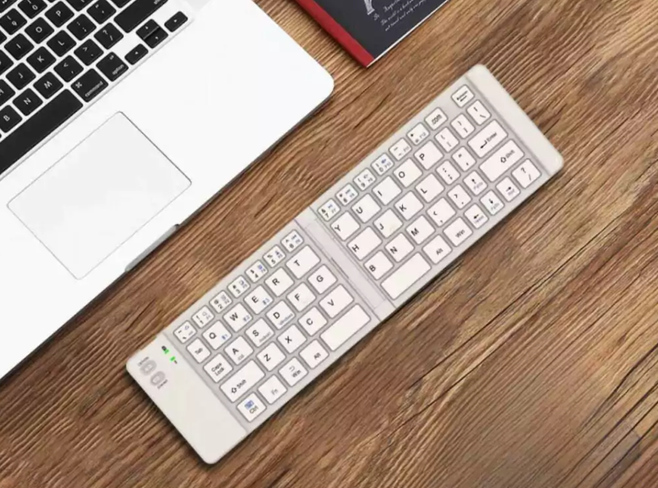 Teclado Ultra Portátil Plegable Recargable para 3 dispositivos BT (A1006) 
