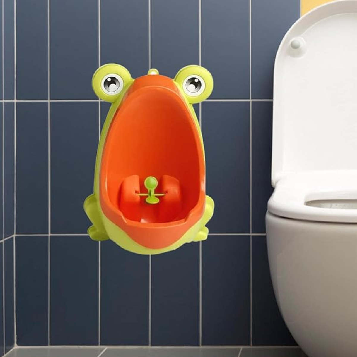 Baño Entrenador Mingitorio Para Bebe Bañito Rana Urinario Niño Naranja