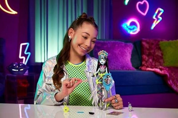 Monster High Monster Fest Doll, Frankie Stein with Glam Outfit & Festival Themed Accessories Like Snacks, Band Poster, Statement Bag & More