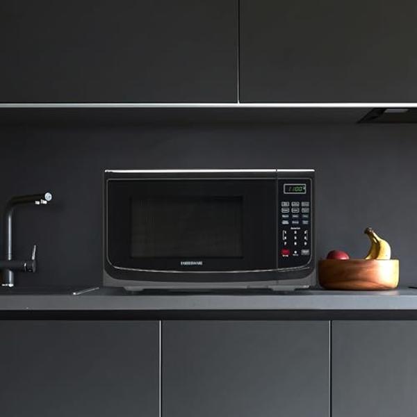 Farberware FM11BKA Compact Countertop Microwave Oven 1.1 Cu. Ft. 1100-Watt with LED Lighting, Child Lock, Easy Clean Grey Interior, Black
