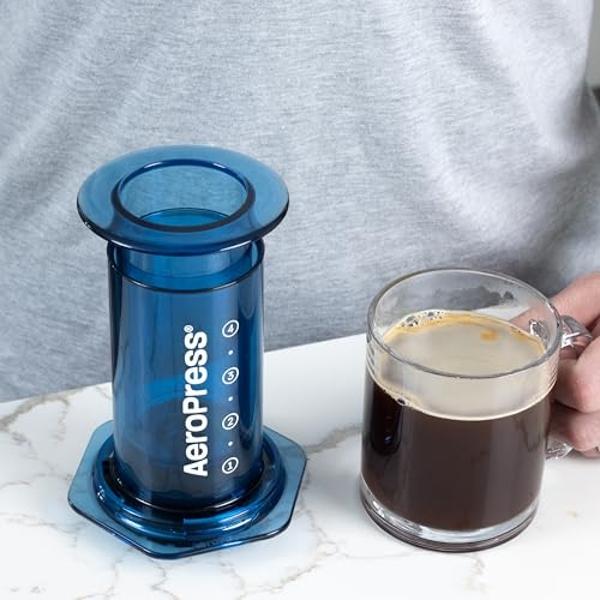 Ninja Pods & Grounds Specialty Single-Serve Coffee Maker, K-Cup Pod Compatible, Built-In Milk Frother, 6-oz. Cup to 24-oz. Travel Mug Sizes, Iced Coffee Maker, Glacier Blue, PB051G