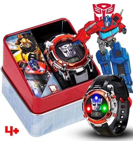 Accutime Transformers LCD Digital Watch for Kids - Iconic Autobot Design, Flashing LED Lights, Black and Red Durable Strap, Comes in Collectible Tin Box