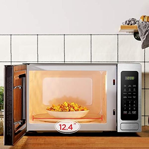 Horno microondas digital BLACK+DECKER EM036AB14 con plato giratorio, puerta con botón pulsador, seguro para niños, acero inoxidable, 1.4 pies cúbicos.